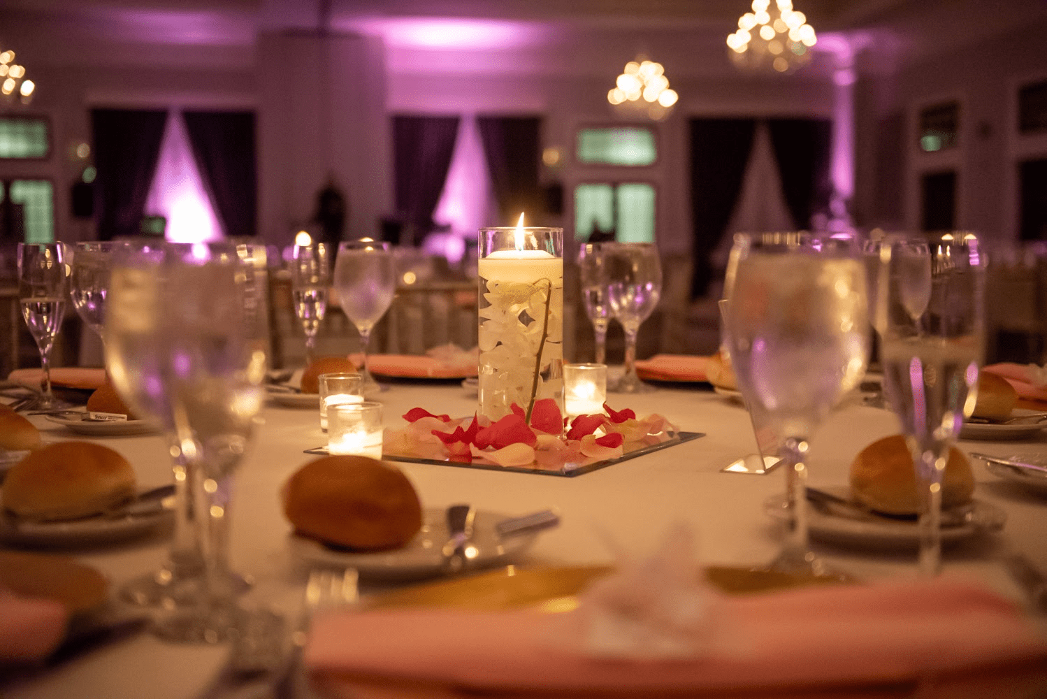 Close up image of a table decorated for a wedding reception