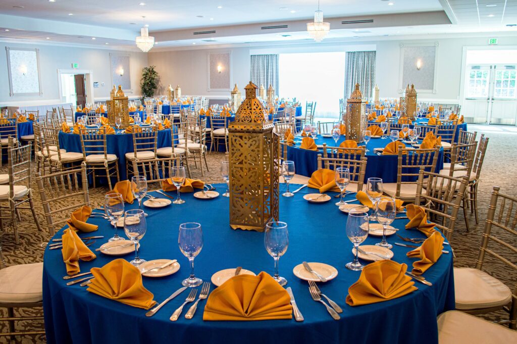 Blue and Yellow table setting with centerpiece